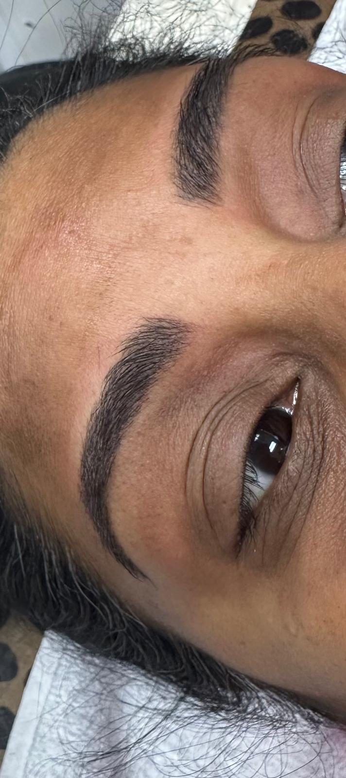 Eyebrow threading and shaping service